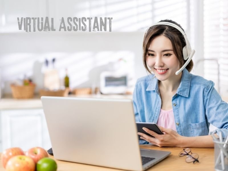 Person working on laptop managing tasks as a virtual assistant