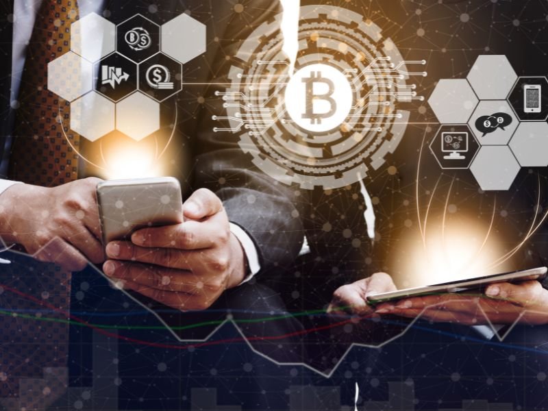 A person analyzing cryptocurrency charts on a computer.